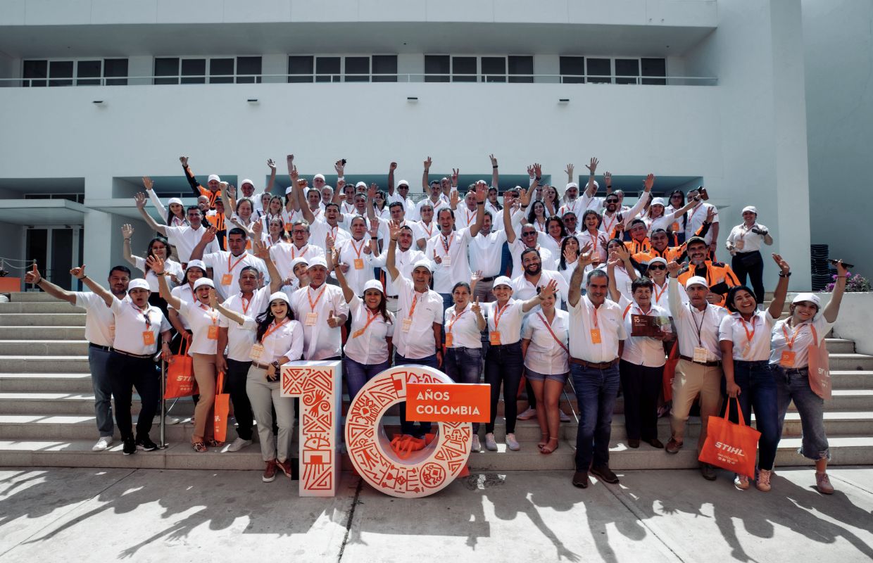 Group picture with cheering people.