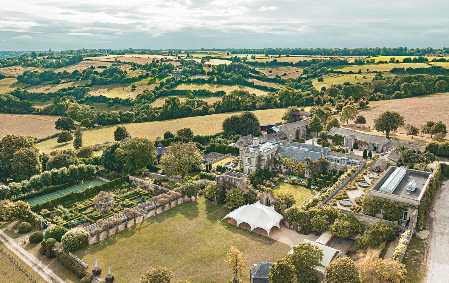 Aerial view of Euridge Manor, which is nestled in a landscape of fields and hedgerows.